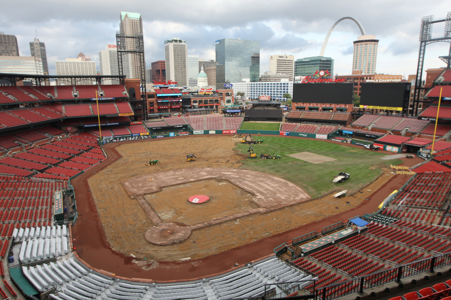 Busch Stadium grounds crew cuts patterns into grass in St. Louis